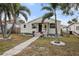 Charming single story home with landscaped yard and walkway at 5044 5Th N Ave, St Petersburg, FL 33710