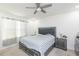 Spacious bedroom with large bed, nightstands, and window coverings at 604 Diamond Ridge Rd, Seffner, FL 33584