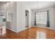 Dining room with hardwood floors and a view into the kitchen at 6106 36Th Ct E, Ellenton, FL 34222