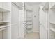 Large walk-in closet with shelving and drawers at 6106 36Th Ct E, Ellenton, FL 34222