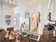 Well-lit kitchen features a stainless steel sink, granite counters, and modern appliances for easy meal preparation at 7833 Carriage Pointe Dr, Gibsonton, FL 33534