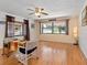 Bright dining area with hardwood floors and large windows at 4042 Boulder Dr, New Port Richey, FL 34653