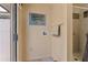 Small laundry area with shower and built in washer hookups at 4042 Boulder Dr, New Port Richey, FL 34653