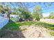 Large backyard with green grass and a shed at 4234 Harrisburg Ne St, St Petersburg, FL 33703