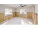 Unfinished bedroom with exposed walls and flooring at 4234 Harrisburg Ne St, St Petersburg, FL 33703