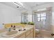 Clean bathroom with shower/tub combo and vanity at 13620 Diamond Head Dr, Tampa, FL 33624