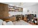 Home office with built-in desk and bookshelves at 13620 Diamond Head Dr, Tampa, FL 33624
