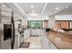 Spacious kitchen with stainless steel appliances and granite countertops at 13620 Diamond Head Dr, Tampa, FL 33624