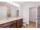 Double vanity bathroom with a walk-in shower and linen closet at 141 Hobo Rd, Rotonda West, FL 33947