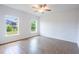 Spacious bedroom with tile flooring and large windows at 141 Hobo Rd, Rotonda West, FL 33947
