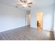 Bright bedroom with tile floors and en-suite bathroom access at 141 Hobo Rd, Rotonda West, FL 33947