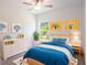 Charming bedroom with light walls, a comfy bed and plenty of light at 141 Hobo Rd, Rotonda West, FL 33947