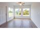 Sunroom with tile flooring and multiple windows offering natural light at 141 Hobo Rd, Rotonda West, FL 33947