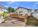 Brick patio with wooden deck and string lights at 2747 3Rd N Ave, St Petersburg, FL 33713