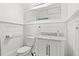 Small bathroom with white vanity and toilet at 2747 3Rd N Ave, St Petersburg, FL 33713