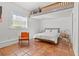 Bedroom with a wooden bed frame and a loft above at 2747 3Rd N Ave, St Petersburg, FL 33713