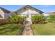 Charming bungalow with landscaped lawn and walkway at 2747 3Rd N Ave, St Petersburg, FL 33713