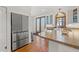 Sleek kitchen features stainless steel fridge and custom cabinetry at 2747 3Rd N Ave, St Petersburg, FL 33713