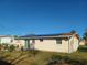 Home features solar panels and a spacious backyard at 3818 Beechwood Dr, Holiday, FL 34691