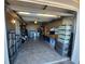 Attached garage with ample storage space for various items at 3818 Beechwood Dr, Holiday, FL 34691
