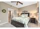 Main bedroom with large bed and nightstands at 4166 Central Sarasota Pkwy # 521, Sarasota, FL 34238