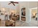 Living room with comfortable seating and built-in entertainment center at 4166 Central Sarasota Pkwy # 521, Sarasota, FL 34238