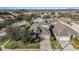 House with a two-car garage and front yard at 4205 Morning Breeze Ct, Tampa, FL 33619