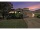 Beautiful home exterior with manicured landscaping and a spacious driveway at 4205 Morning Breeze Ct, Tampa, FL 33619
