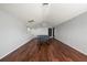 Spacious game room featuring hardwood floors, recessed lighting, projector and vaulted ceilings at 4205 Morning Breeze Ct, Tampa, FL 33619