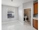 Bright laundry room with tile flooring and modern appliances at 4205 Morning Breeze Ct, Tampa, FL 33619