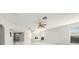Bright and airy living area showcasing the high ceilings and sleek tile floors at 4205 Morning Breeze Ct, Tampa, FL 33619