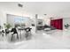 Open-concept living space with dining area and comfortable seating at 4205 Morning Breeze Ct, Tampa, FL 33619