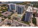 Residential complex with multiple buildings, pool, and surrounding cityscape at 450 Knights Run Ave # 1102, Tampa, FL 33602