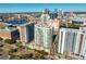 Modern high-rise buildings in an urban setting with water views and landscaping at 450 Knights Run Ave # 1102, Tampa, FL 33602