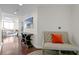 Elegant foyer with a sitting area and view of the living room at 450 Knights Run Ave # 1102, Tampa, FL 33602