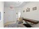 Hallway with elegant furnishings and decor leading to an exit at 450 Knights Run Ave # 1102, Tampa, FL 33602