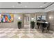 Elegant lobby with grand piano and checkered flooring at 450 Knights Run Ave # 1102, Tampa, FL 33602