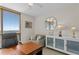 Bright home office featuring a desk, a sitting area, and city views at 450 Knights Run Ave # 1102, Tampa, FL 33602