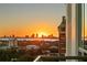 Sunset view from a balcony overlooking a bay and city skyline at 450 Knights Run Ave # 1102, Tampa, FL 33602
