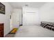 Cozy bedroom featuring neutral decor, closet space, and soft carpeting at 5193 Deltona Blvd, Spring Hill, FL 34606