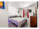 Inviting bedroom with a comfortable bed, natural light, and ample closet space at 5193 Deltona Blvd, Spring Hill, FL 34606