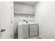 Laundry room equipped with a washing machine and dryer at 5193 Deltona Blvd, Spring Hill, FL 34606