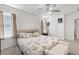 Bright main bedroom boasts ample natural light and neutral decor at 5193 Deltona Blvd, Spring Hill, FL 34606
