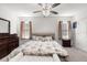 Bright main bedroom boasts ample natural light and neutral decor at 5193 Deltona Blvd, Spring Hill, FL 34606