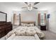 Bright main bedroom boasts ample natural light and neutral decor at 5193 Deltona Blvd, Spring Hill, FL 34606