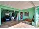 Covered carport with golf cart and storage at 1535 Council Dr, Sun City Center, FL 33573