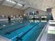 Indoor lap pool with plenty of space for swimming at 1535 Council Dr, Sun City Center, FL 33573