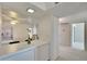 Kitchen with a breakfast bar and views into another room at 1535 Council Dr, Sun City Center, FL 33573