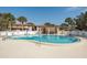 Community pool with ample deck space and seating at 1843 Bough Ave # A, Clearwater, FL 33760