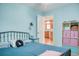 Bedroom with a queen bed and access to the kitchen at 18675 Us Highway 19 N # 189, Clearwater, FL 33764